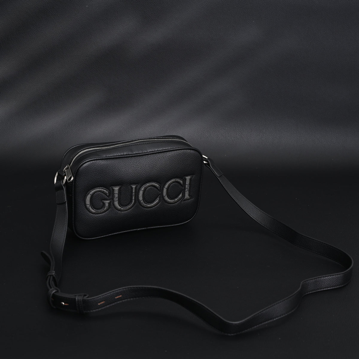 Gucci Black Leather Embossed Logo Belt Bag